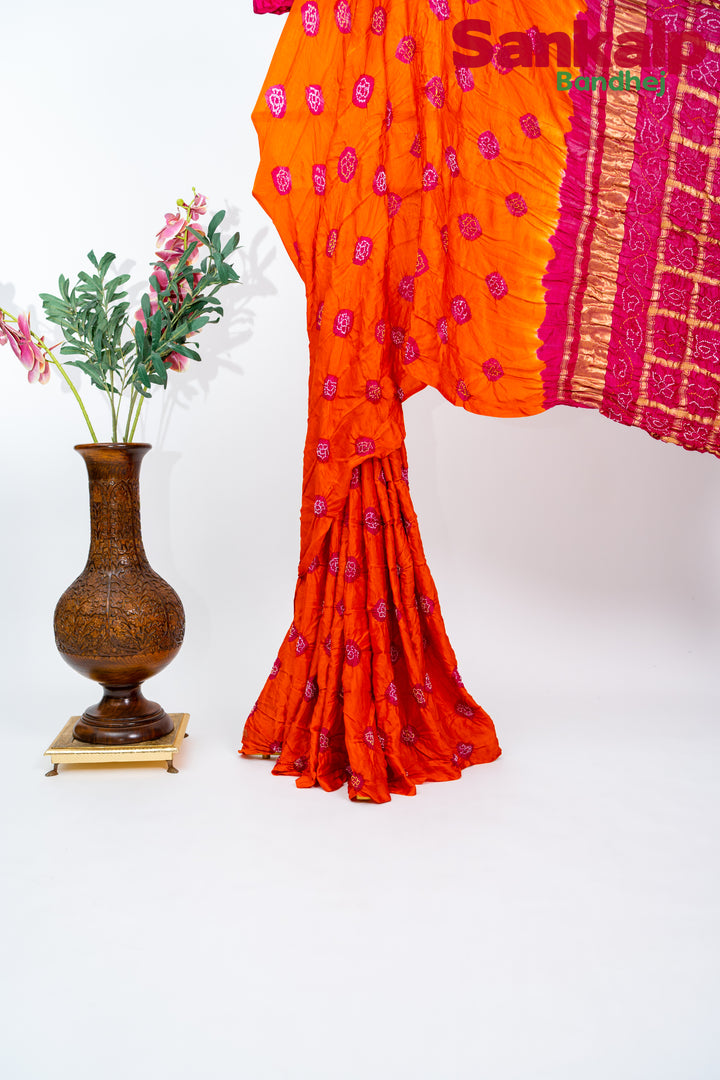 Rani Orange Gulti Gaji Silk Bandhani Saree