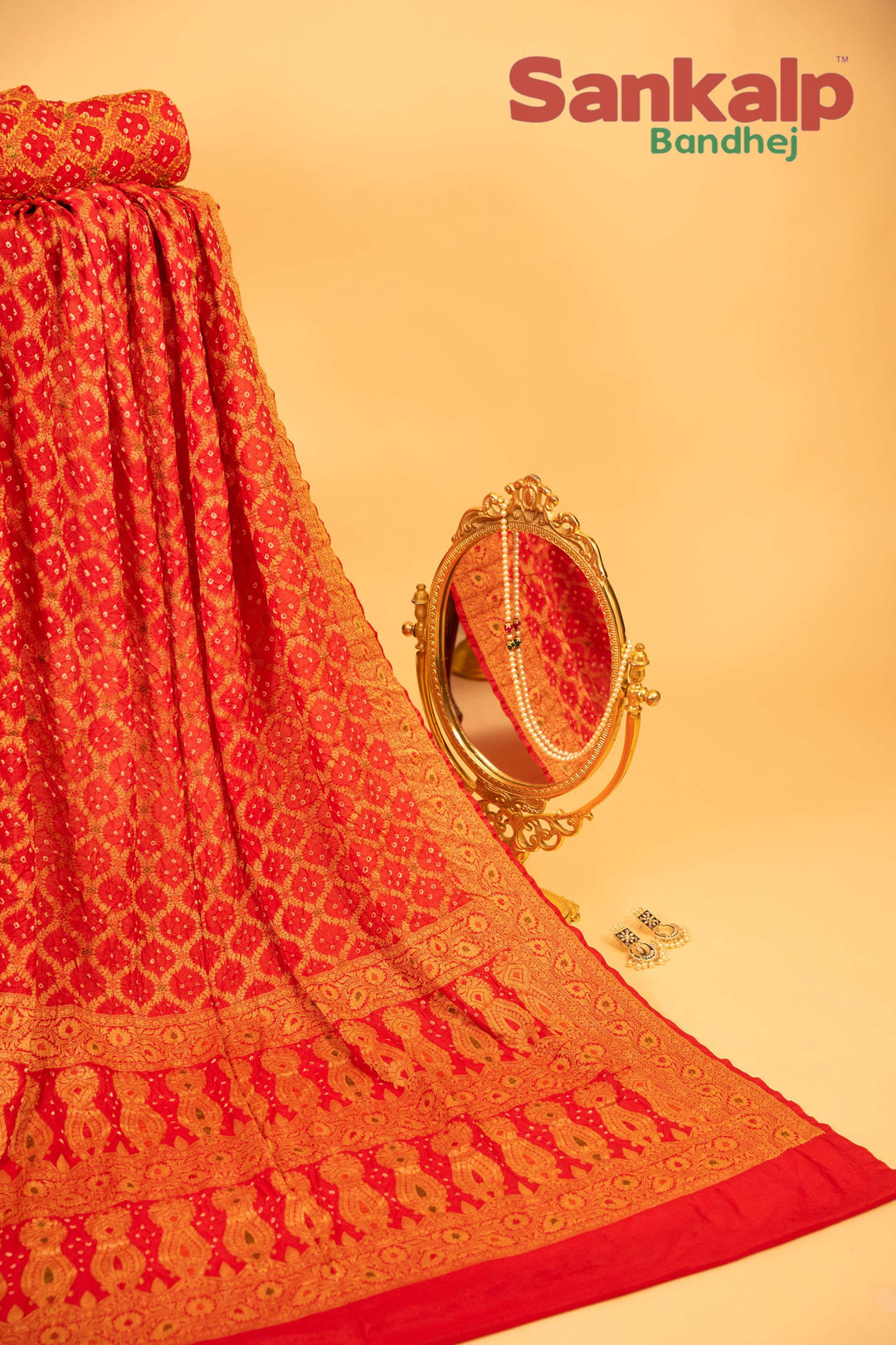 Pure Dupion Silk Bandhej Saree With Meena Work in Orange Color